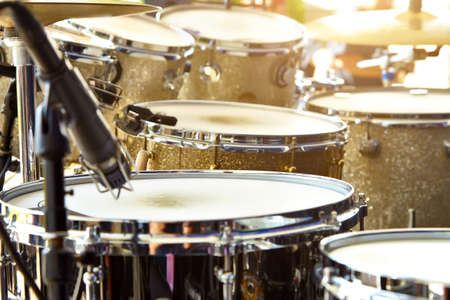 Acoustic drum set on stage before the concert.