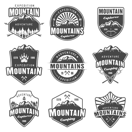 Mountain travel, outdoor adventure, camping and hiking set of black vector emblems, labels, badges and logos isolated on white backgroundのイラスト素材