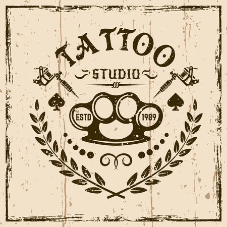 Tattoo studio vector emblem in vintage style on background with grunge texturesのイラスト素材