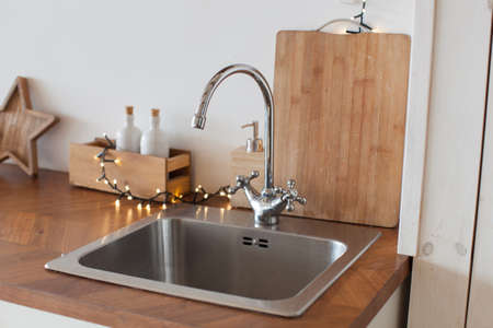 Kitchen sink. Scandinavian interior. White color. Stay at home. Christmas mood and decoration.