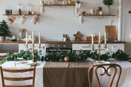 New Years table setting. Waiting for Christmas. Kitchen interior with decoration.の写真素材