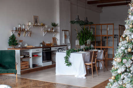 New Years table setting. Waiting for Christmas. Kitchen interior with decoration.の写真素材