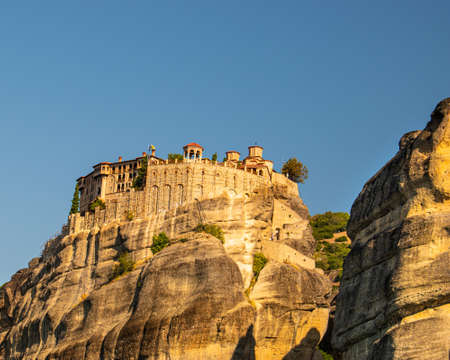 Monastery Meteora Greece. Stunning  panoramic landscape. View of mountains and green forest against...