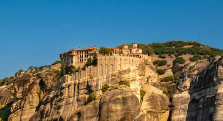 Monastery Meteora Greece. Stunning  panoramic landscape. View of mountains and green forest against epic blue sky with clouds.の写真素材