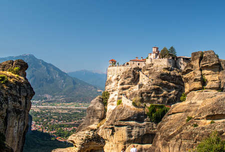 Monastery Meteora Greece. Stunning  panoramic landscape. View of mountains and green forest against...