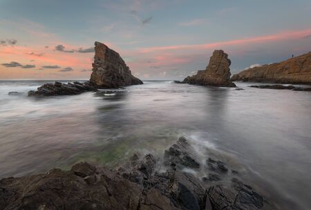 Magnificent sunset over the rock phenomenon The Ships, Sinemorets village, Bulgariaの写真素材