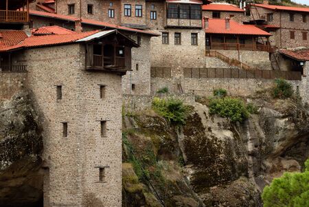 Great Meteoron Monastery. Beautiful scenic view, ancient traditional greek building on the top of huge stone pillar in Meteora, Eastern Orthodox Church, Pindos, Thessaly, Greece, Europeの写真素材