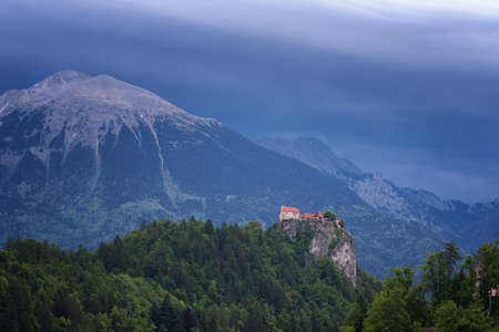 Amazing view on Bled lake, Bled castle at sunrise with mountain Triglav in background. Slovenia, Europeのeditorial素材