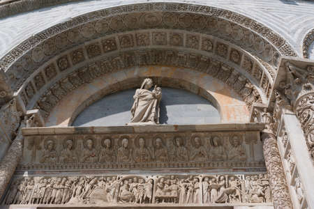 Details of the exterior of the Pisa Baptistery of St. John, the largest baptistery in Italy, in the Square of Miracles (Piazza dei Miracoli), Pisa, Italy.のeditorial素材