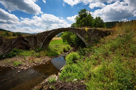 Daily landscape.Old Roman bridge near Batak dam, Bulgariaの写真素材