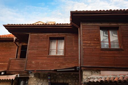 Old Bulgarian houses in the town of Nesebar, Bulgaria. In 1956 Nesebar was declared as museum city, archaeological and architectural reservation by UNESCO.の写真素材