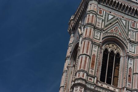 Eighty-five meter high tower Giotto's Campanile (designed in 1334 by Giotto di Bondone) - bell tower of the Basilica di Santa Maria del Fiore. Florence, Italy.の写真素材
