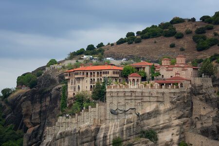 Great Meteoron Monastery. Beautiful scenic view, ancient traditional greek building on the top of huge stone pillar in Meteora, Eastern Orthodox Church, Pindos, Thessaly, Greece, Europeの写真素材