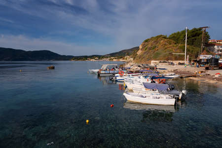 Agios Sostis, Zakynthos Island, Greece September 24, 2017: Boats in Laganas harbor on a summer cloudy day.のeditorial素材