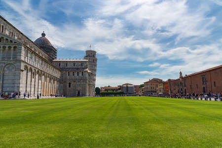 Stunning daily view at the Pisa Baptistery, the Pisa Cathedral and the Tower of Pisa. They are located in the Piazza dei Miracoli (Square of Miracles) in Pisa, Italy.の写真素材