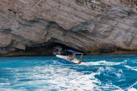 ZAKYNTHOS, GREECE, September 27, 2017: Blue Caves and blue water of Ionian sea on Island Zakynthos in Greece and sightseeing points. Rocks in clear blue seaのeditorial素材