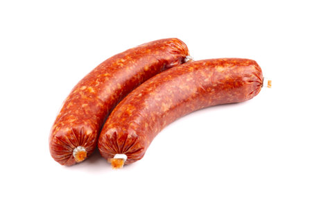 Bratwurst without casing - delicious sausages, bratwurst without casing isolated on a white backgroundの写真素材