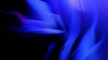 blue and black grainy abstract speed blur background with noise texture for header poster banner backdrop designの写真素材