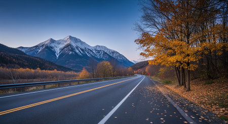 Autumn road in the mountains. Beautiful landscape with road and mountains.の素材