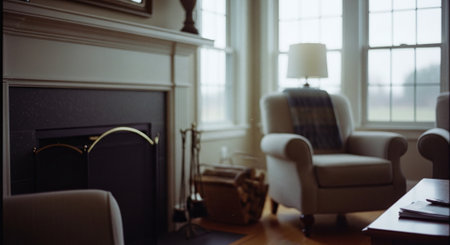 Living room interior with armchair and fireplace. Blurred background.の素材