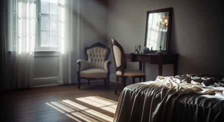 Interior of a hotel room with a vintage chair and a windowの素材