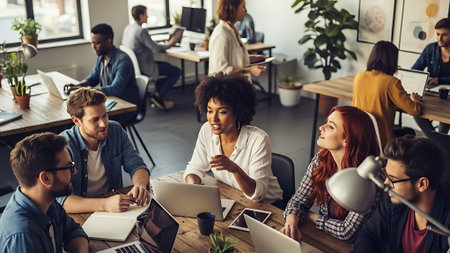 Group of multiethnic business people in smart casual wear working together in the office.の素材