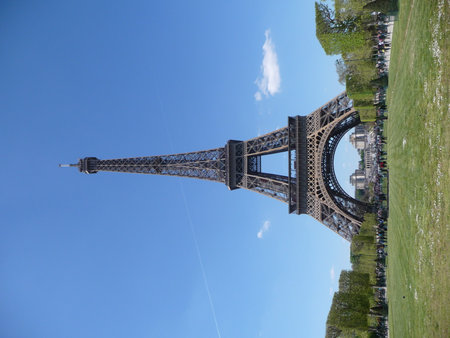 Stunning view of the Eiffel Tower against a blue sky on a sunny  day in Paris, France.の写真素材