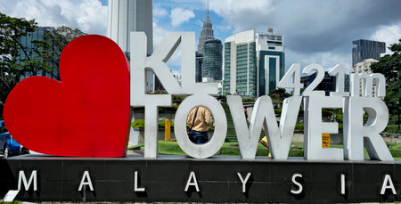 May 1, 2023, Kuala Lumpur, Malaysia. Iconic I Love KL Tower Malaysia Sign with 421m Landmark in Backgroundのeditorial素材