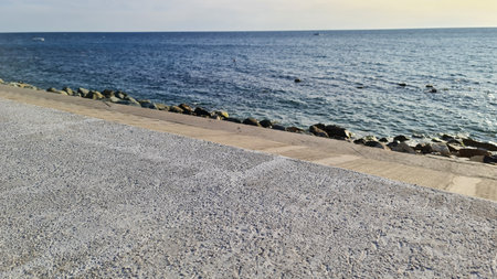 Pavement on the seashore in the evening.の写真素材