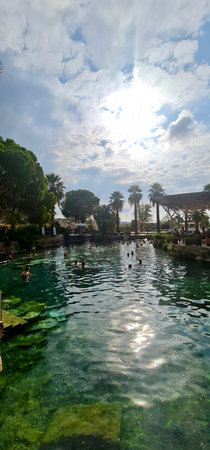 October, 8, 2022, Pamukkale, Turkey. Scenic view of the Cleopatra Antique Pool with thermal mineral water and submerged Roman ruins in Pamukkale, Turkey.のeditorial素材