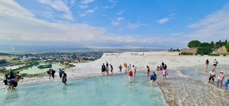 October, 8, 2022, Pamukkale, Turkey. Tourists Walking on White Travertine Terraces in Pamukkale, Turkey.のeditorial素材