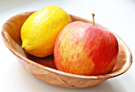 Apple with lemon on a white backgroundの写真素材
