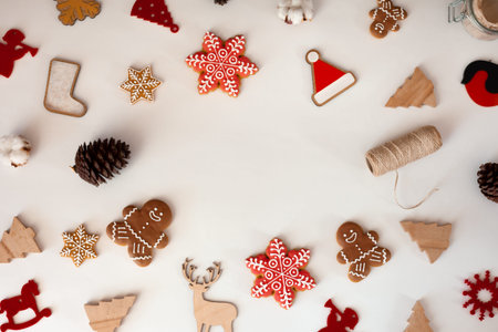 Christmas and New Years eco decorations and homemade gingerbreads on a white background. Perfect...