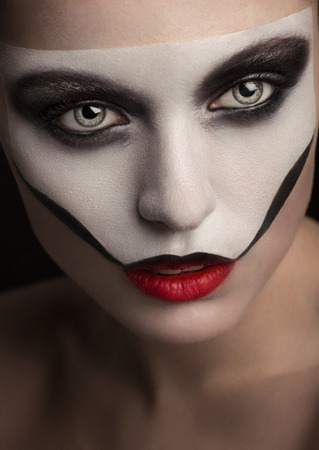 Makeup with painted skull maskの写真素材