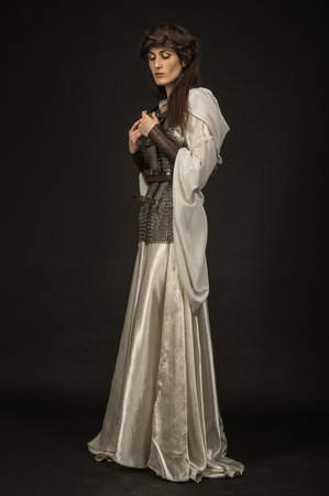 Beautiful Girl warrior in medieval clothesの写真素材