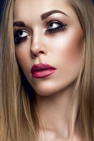 Beautiful portrait of a woman with fashion makeupの写真素材