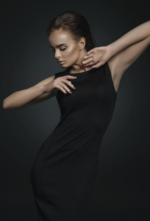 Fashion model in black dressの写真素材