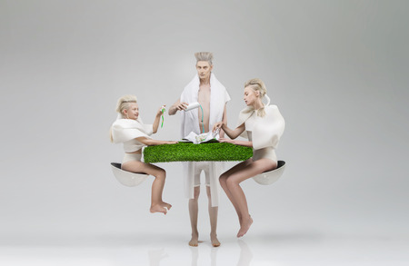 Futuristic family at breakfastの写真素材