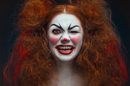 Crazy female clown portraitの写真素材