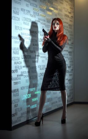 Sexy woman with pistolの写真素材