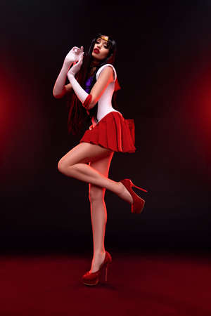 Fashion portrait of model with creative make up posing in studioの写真素材