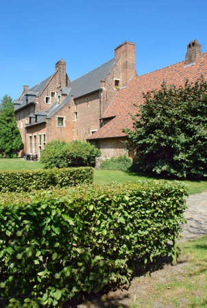 Medieval houses in the Spanish Quarter of the Louvain (Belgium) beguinage. View from the park outside.の写真素材