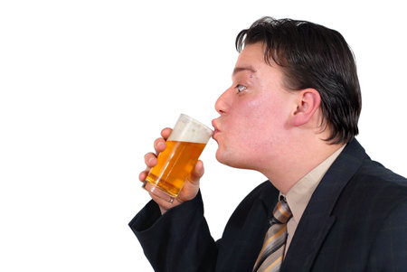Alternative punk businessman drinking cold beer. Isolated over white with copyspace.