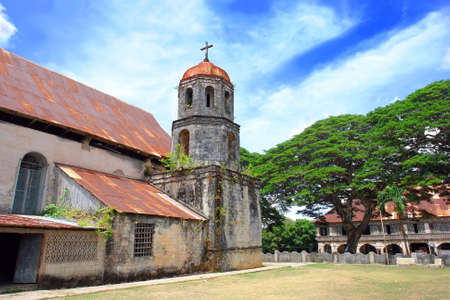 Filipino Catholic Church, bell tower and Convent of St. Isidore Labradore in Lazi on Siquijor Island, built 1857-1884. の写真素材