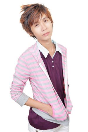 Korean young male fashion model posing and standing in mauve-pink outfit. Isolated over white.の写真素材