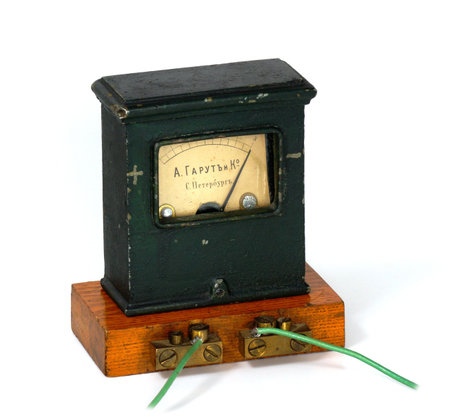 The ancient ammeter on a wooden support       の写真素材