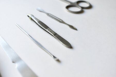A variety of tools for pedicure on a white backgroundの写真素材