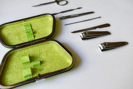 Green handbag with a set for a pedicure