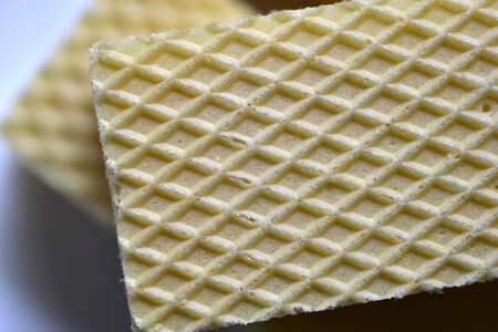 Some delicious sugar waffles on a white plateの写真素材