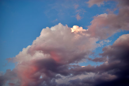 Blue sky with beautiful blue red clouds in the evening
